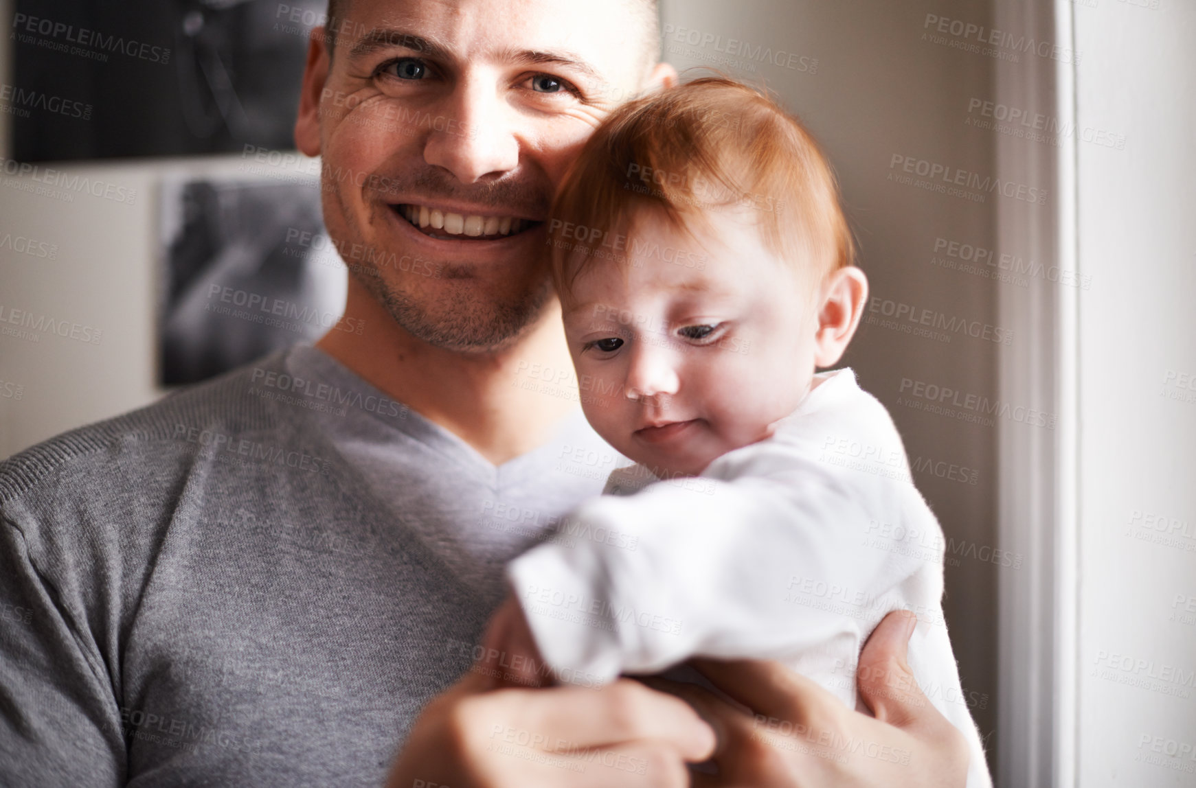 Buy stock photo Happy, portrait or father and baby in a house with love, trust or child development, support or bonding. Family, face or dad with kid at home for learning, safety or morning games, gratitude or pride