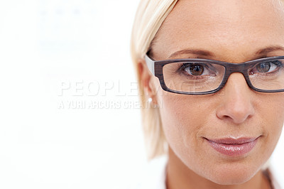 Buy stock photo Woman, glasses and portrait on a white background for eye care, wellness and frame in closeup. Face of a young person in optometry with vision, lens and specs or eyewear in studio with mock up space