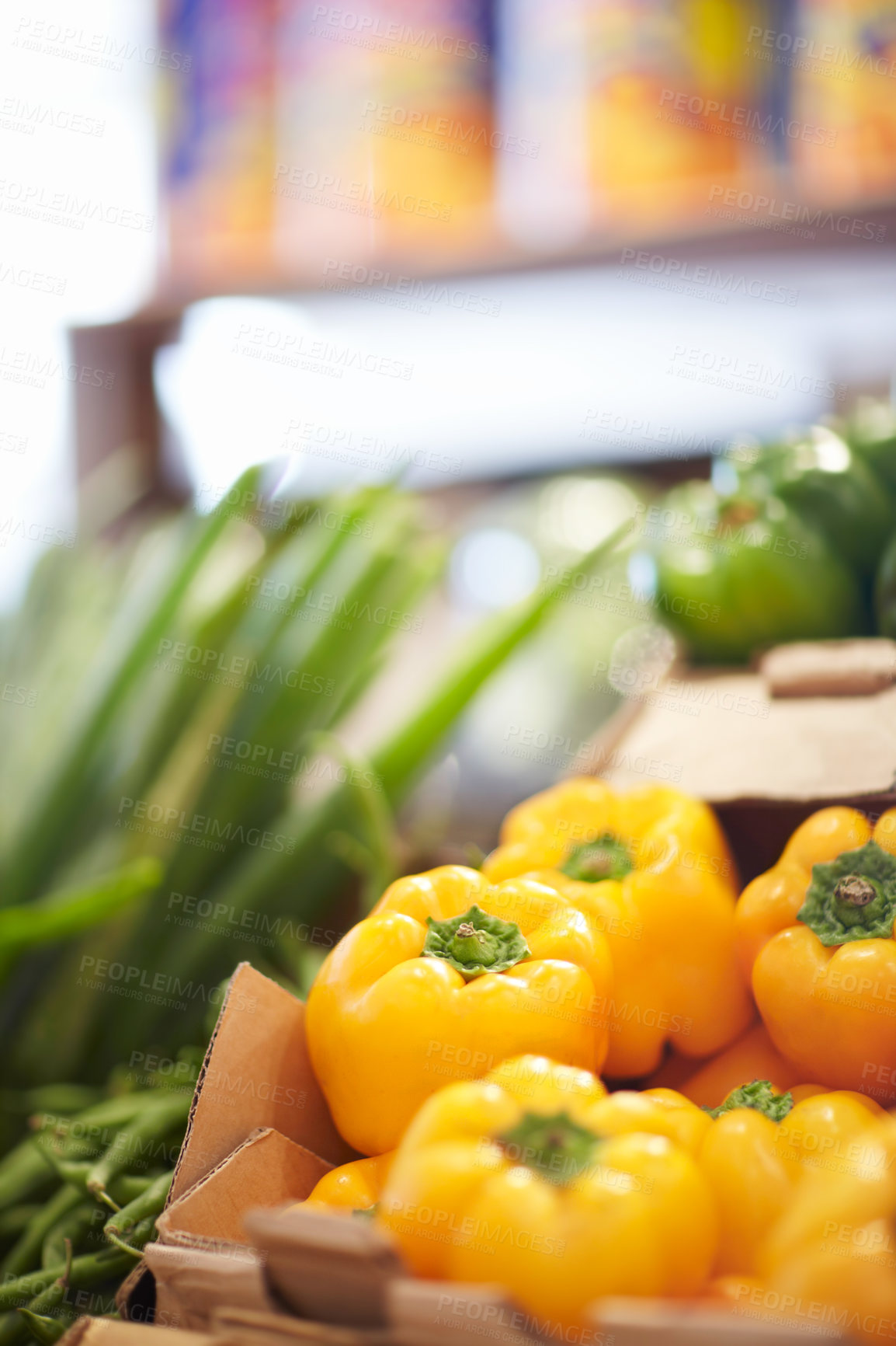 Buy stock photo Shot of a fresh yellow peppers in a supermarket