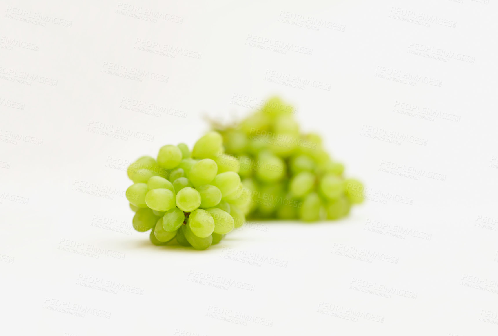 Buy stock photo Grapes, green fruit and healthy food in studio for art and creativity for nutritionist. Fruits, wellness diet and nutrition with clean, vegan or grape snack isolated on a white background for health