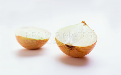 Buy stock photo Onion half, vegetable and healthy food in studio for nutritionist food, meal or organic lunch. Cooking, wellness diet and nutrition with cut, chopped or vegan ingredient isolated on white background