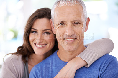 Buy stock photo Shot of a mature man and his younger wife