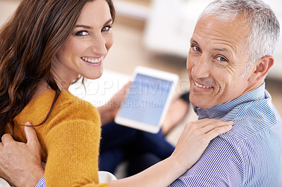 Buy stock photo Couple, portrait and happy with tablet in home with hug for bonding, screen and relax with social media or internet. Senior man, woman or face with digital display for subscription or embrace on sofa