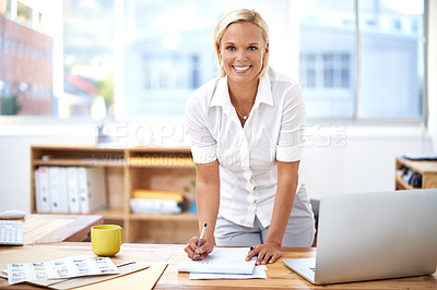 Buy stock photo Happy, smile and portrait of a businesswoman in her office writing on paper for startup planning. Confidence, success and professional female hr manager working on a company report in the workplace.