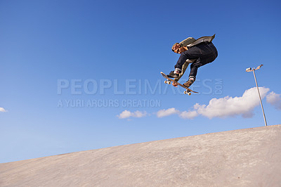 Buy stock photo Skateboard, blue sky and man with ramp, fitness and training for a competition and sunshine. Adventure, person and skater with practice for technique and skating style with exercise, energy or cardio