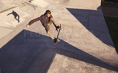 Buy stock photo Skateboard, jump or man with ramp, challenge or training for a competition, hobby or sunshine. Adventure, person or skater with practice for technique, talent or skill with exercise, energy or cardio