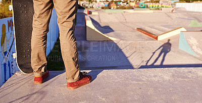 Buy stock photo Man, legs and skateboard for hobby at skatepark with practice or training to play, trick and committed. Closeup, exercise and experience on break or leisure to enjoy for activity, sport and fitness