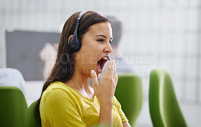 Buy stock photo Woman, headset and yawn or tired in call centre, burnout and mental health for fatigue at helpdesk. Female person, hotline or virtual assistant is exhausted or overworked, consultant and operator