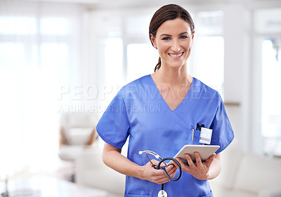 Buy stock photo Cropped shot of a young female doctor holding a tablet