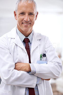 Buy stock photo Healthcare, portrait and medical professional with arms crossed in hospital for support, services and wellness. Medicine, surgeon and happy mature male doctor for confident, smile and treatment
