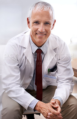 Buy stock photo Portrait, senior doctor and smile of man in hospital for healthcare, wellness or working in Australia for career. Happy, medical professional and surgeon, expert or physician in clinic for service