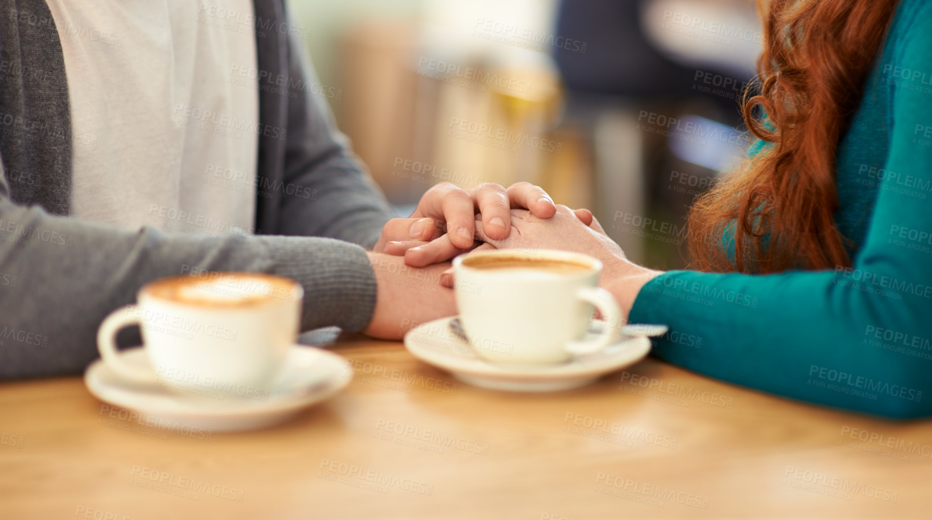 Buy stock photo Holding hands, coffee and couple in cafe, support and trust in relationship or marriage together. Diner, adult and partner with compassion, love and care for with respect on date, weekend and break