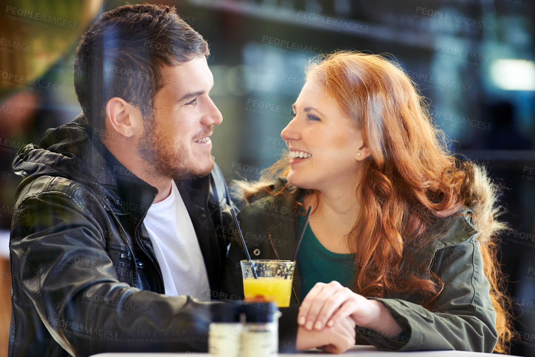Buy stock photo Look, happy and couple in restaurant for care on date for relationship anniversary with commitment, support and trust. Man, woman and in love together, hand holding and affection in cafe for bonding.