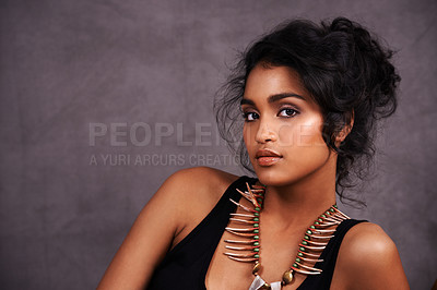 Buy stock photo Indian woman, confident and fashion with jewelry in studio on grey background for heritage or culture. Portrait, female person and beauty with traditional necklaces, outfit and heritage look. 