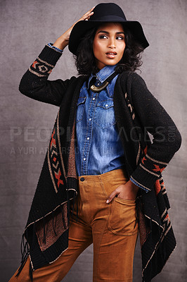 Buy stock photo Studio shot of a beautiful young ethnic woman wearing a Mexican-style outfit