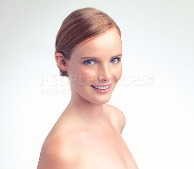 Buy stock photo Portrait of a beautiful young woman smiling at the camera