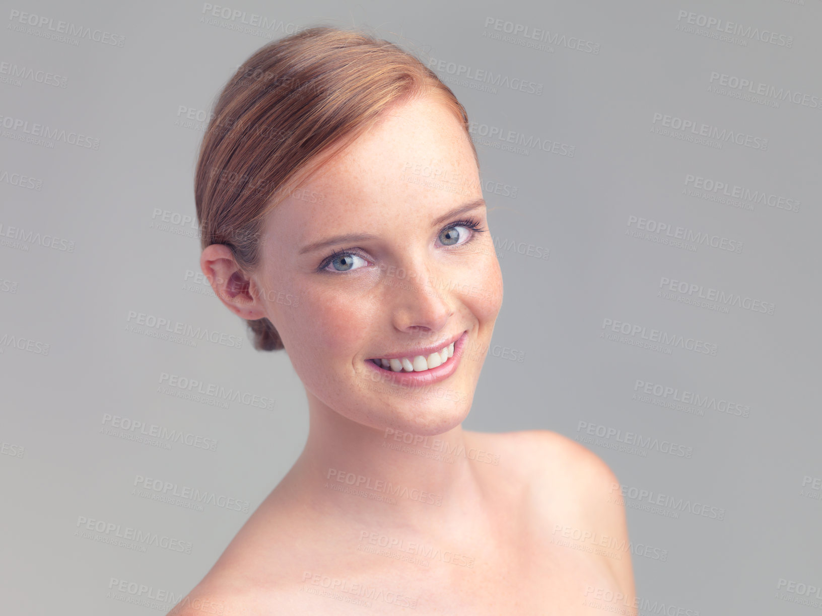 Buy stock photo Head and shoulders shot of a beautiful nude woman isolated on grey