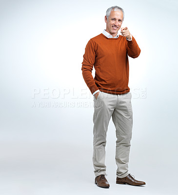 Buy stock photo Portrait, mature man and finger pointing in studio with mockup, smile and happiness in white background. Fashion, formal and professional outfit for trendy, cool and retro style for senior person