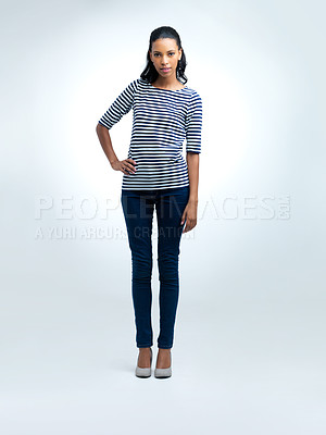 Buy stock photo Studio, portrait and black woman with clothes for fashion, stylish and confident for aesthetic. White background, adult and female person with pride in denim jeans, relax and girl with comfort