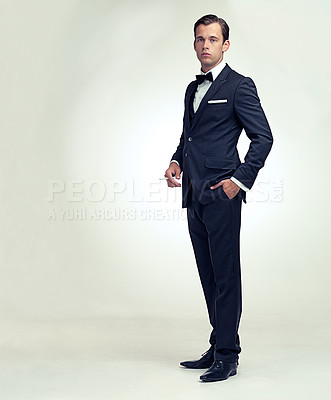 Buy stock photo Portrait, suit and fashion with gentleman, cigarette and stylish clothes on a white studio background. Full body, person and model with elegant outfit and business with leader or smoking with tobacco