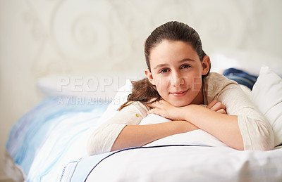 Buy stock photo Girl, relax and portrait on bed in home, wellness and peace or calm for waking up on weekend. Happy female person, pillow and comfortable in bedroom for rest or smile, blanket and lazy in apartment