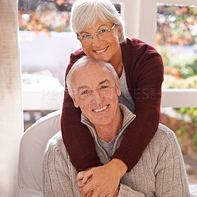 Buy stock photo Couple, mature and portrait with embrace, window and home for happy retirement. Senior man, woman and marriage with elderly, care and love for healthy relationship and romantic rest and relaxation