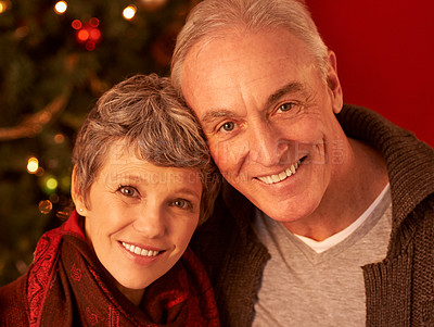 Buy stock photo Christmas, smile and portrait of senior couple, decorations and celebration with love and happiness. Grandparents, retirement or face on Christian holiday, affection or elderly man and wife in home
