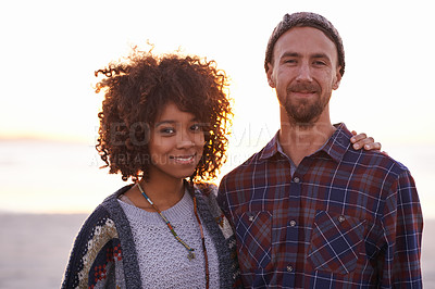 Buy stock photo Love, portrait and happy couple at a beach with hug, support or bonding at sunset in nature. Face, smile and people embrace at the ocean for sunrise journey, adventure or romance in Hawaii together
