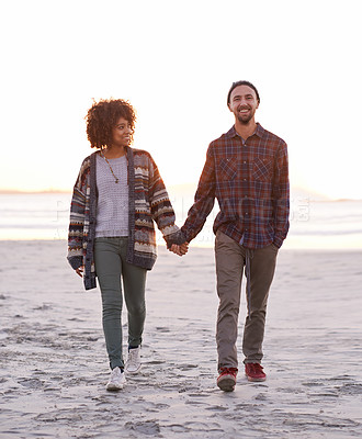 Buy stock photo Couple, smile and walking together on beach, happy calm people on vacation. Ocean, outdoor and partners in love with respect and care, date and romantic stroll for relax with seaside sunrise