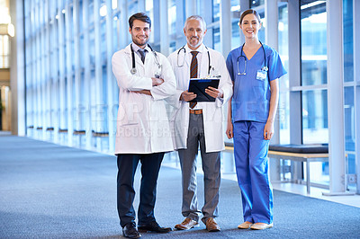 Buy stock photo Medical, clipboard and portrait of team in hospital lobby with trust, support or collaboration in healthcare service. Smile, doctors and nurse at clinic with wellness, confidence and health insurance