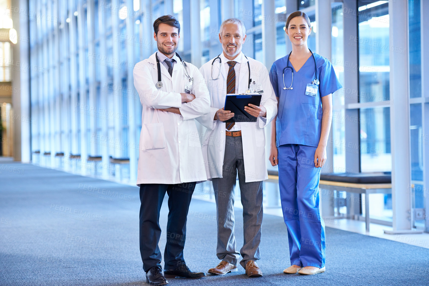 Buy stock photo Medical, clipboard and portrait of team in hospital lobby with trust, support or collaboration in healthcare service. Smile, doctors and nurse at clinic with wellness, confidence and health insurance