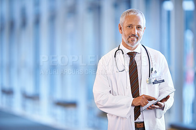 Buy stock photo Portrait, healthcare and tablet with a senior doctor standing in a hospital corridor for research or insurance. Medical, trust and technology with a man medicine professional in a clinic for health