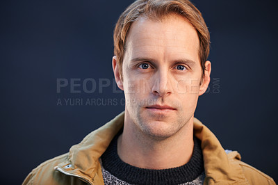 Buy stock photo A cropped studio shot of a handsome man looking serious