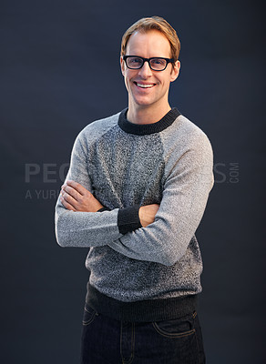 Buy stock photo Happy, nerd and portrait of man in studio with arms crossed and pride on dark background. Confident, programmer and person with a smile in development of solution for IT project in mockup space