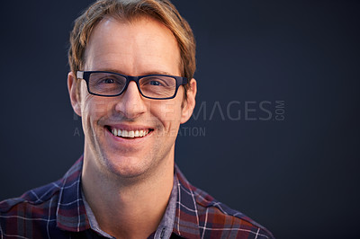 Buy stock photo A studio portrait of a handsome man wearing glasses