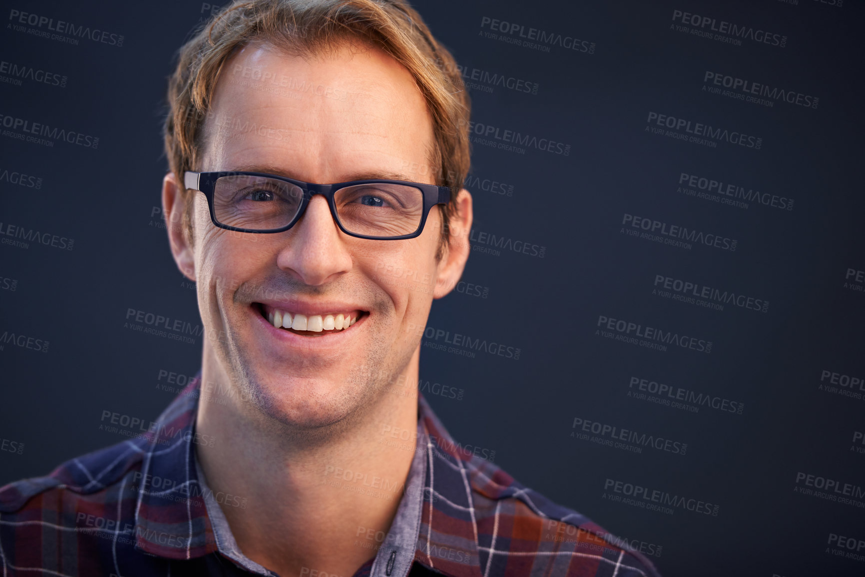 Buy stock photo A studio portrait of a handsome man wearing glasses