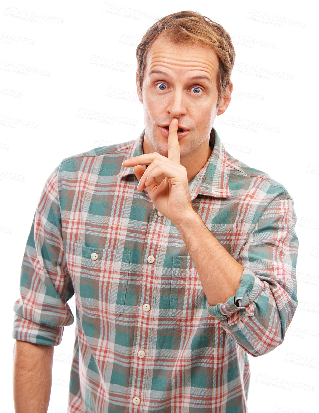 Buy stock photo Studio shot of a handsome young man posing against a white background