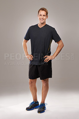 Buy stock photo Studio shot of a handsome young man in sportswear 
