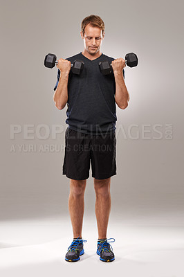 Buy stock photo Man, dumbbells and weightlifting fitness in studio or exercise performance, training or grey background. Male person, equipment and healthy workout for muscle athlete or challenge, biceps or mockup
