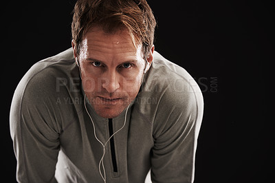 Buy stock photo Portrait, tired and man with fitness, breathing and healthy athlete on a dark studio background. Face, person and model with wellness and exhausted with burnout and fatigue with exercise and workout