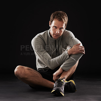 Buy stock photo Studio portrait of a handsome young man in sportswear