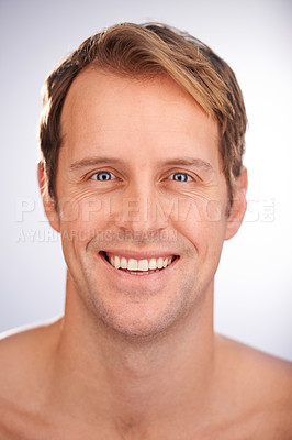 Buy stock photo Man, portrait and skincare dermatology with smile for healthy hygiene for cosmetic treatment, cleaning or white background. Male person, face and model or morning wellness, studio or mockup space