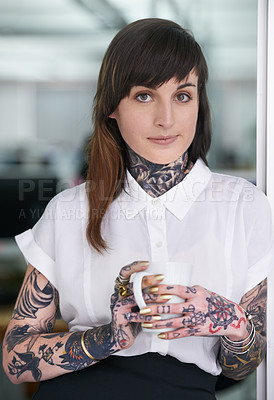 Buy stock photo Tattoos, coffee and portrait of business woman in office with positive, pride and confident attitude. Grunge, smile and edgy female creative designer with ink skin standing in modern workplace.