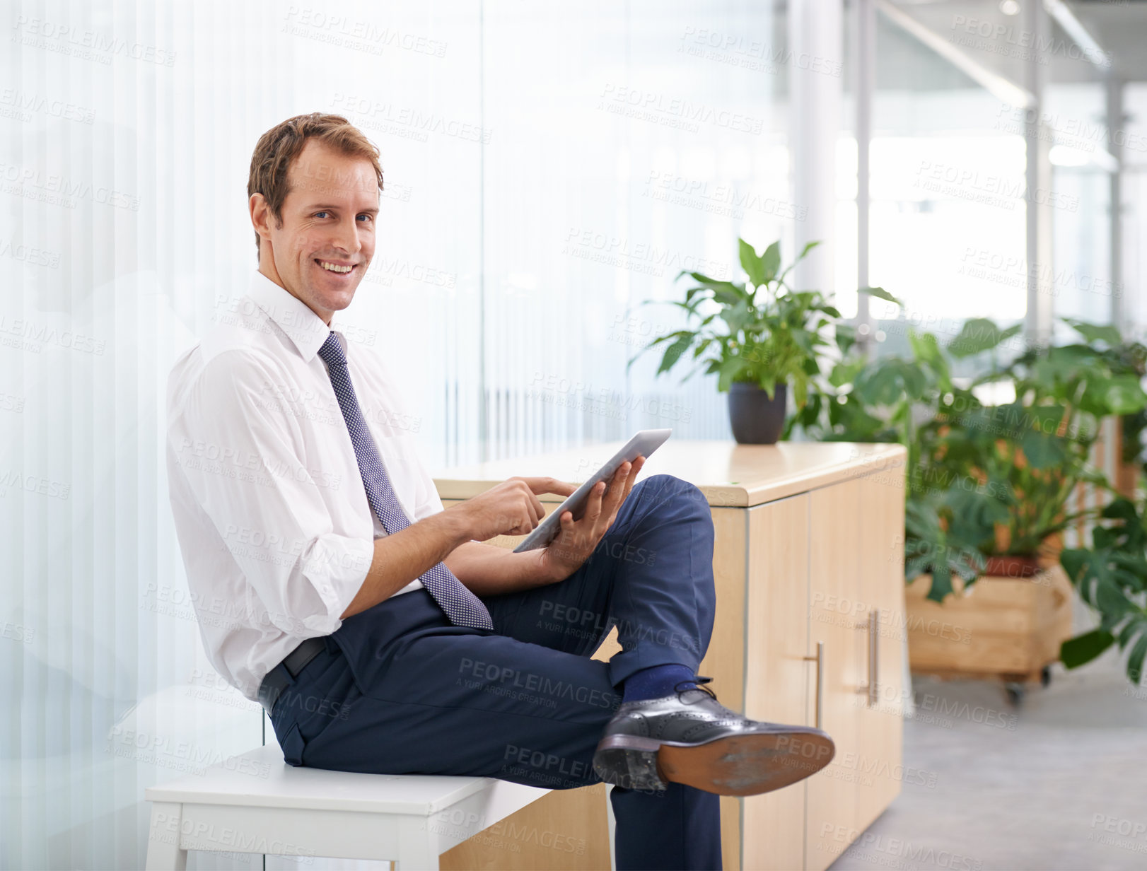 Buy stock photo Portrait, relax and man in office with tablet, sales review or profit report at online consulting agency. Internet, business growth or development for happy businessman on digital app for budget plan