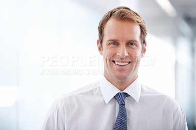 Buy stock photo Portrait of a handsome and confident businessman standing in an office