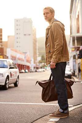 Buy stock photo Morning, street and man in city with bag for travel, commute and journey in urban town. Fashion, walking and person with trendy style, clothes and outfit for holiday, vacation and weekend outdoors