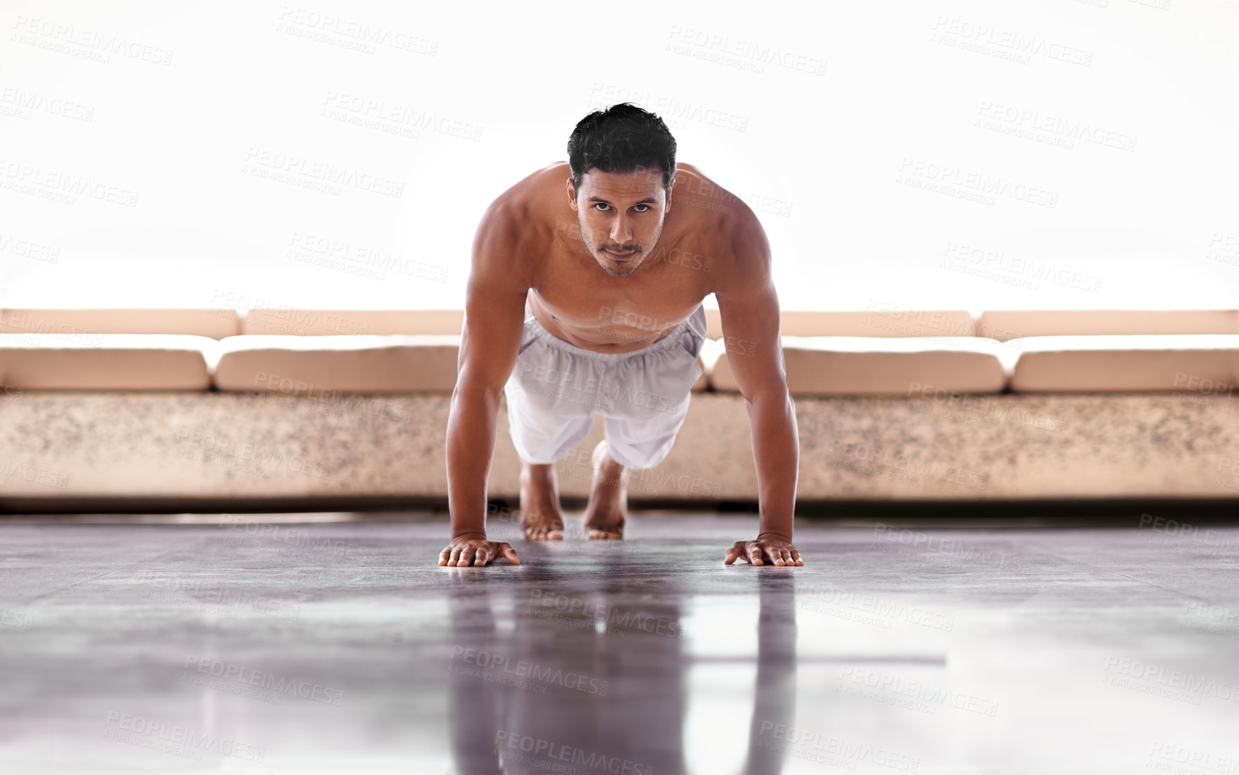 Buy stock photo Portrait of a man doing push-ups on a balcony