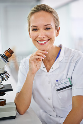 Buy stock photo Happy woman, portrait and scientist with microscope for biology, science or chemistry at clinic. Face of female person or medical professional with smile in confidence for healthcare research or exam