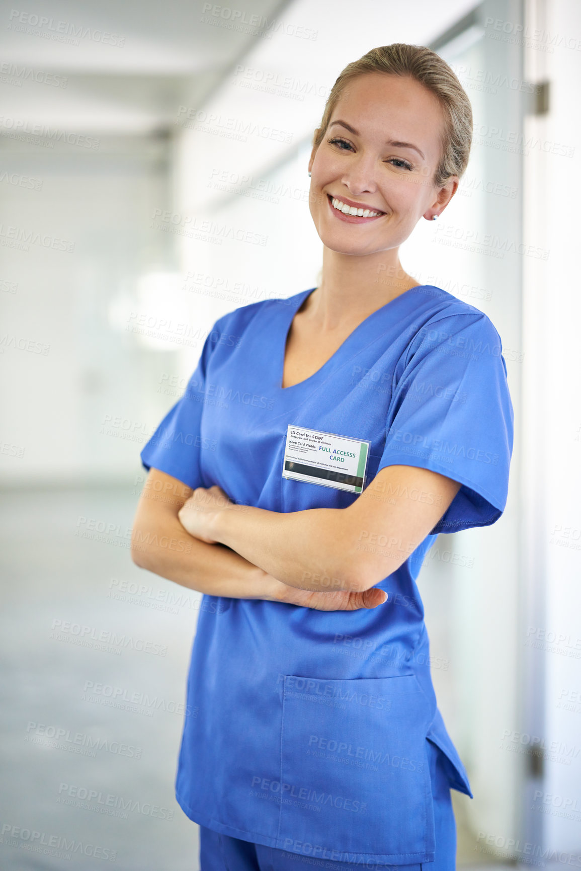 Buy stock photo Happy woman, portrait and nurse with confidence in career ambition for healthcare or science at hospital. Young female person, scrub or medical doctor with smile or arms crossed for PHD at the clinic