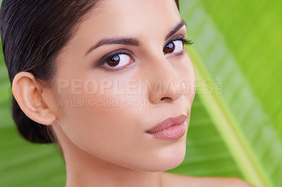 Buy stock photo Portrait, woman and beauty with palm leaf background, makeup and natural skincare with dermatology. Organic, nature and eco friendly cosmetics, clean facial with wellness and sustainable treatment